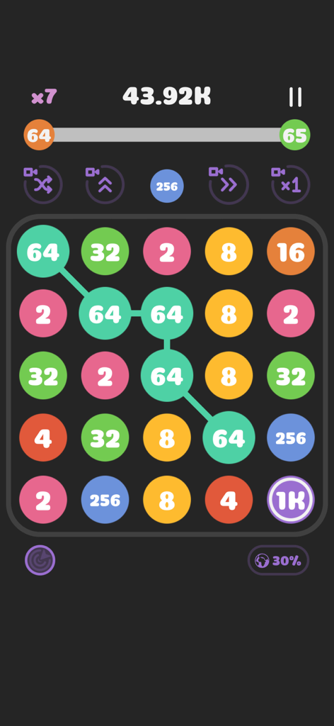 Connect the Pops! - Una cuadrícula colorida de burbujas numeradas en el juego Connect the Pops mostrando una secuencia de 64 pops conectándose para fusionarse