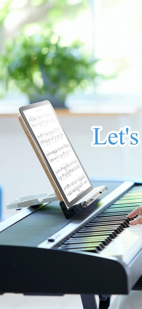 Canon Viewer - Sheet music - An iPad displaying digital sheet music from the Canon Viewer app on a piano music stand while a person plays.
