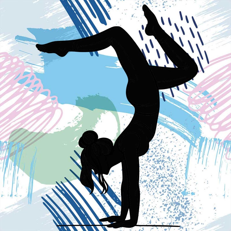 a woman doing a handstand