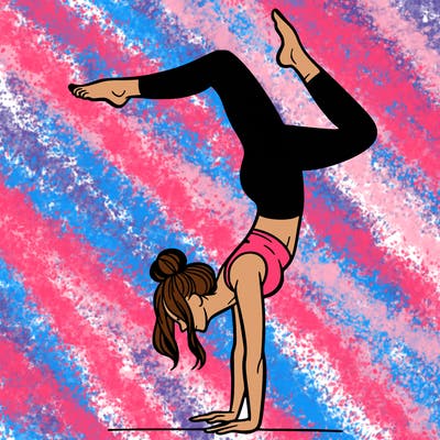 a woman doing a handstand