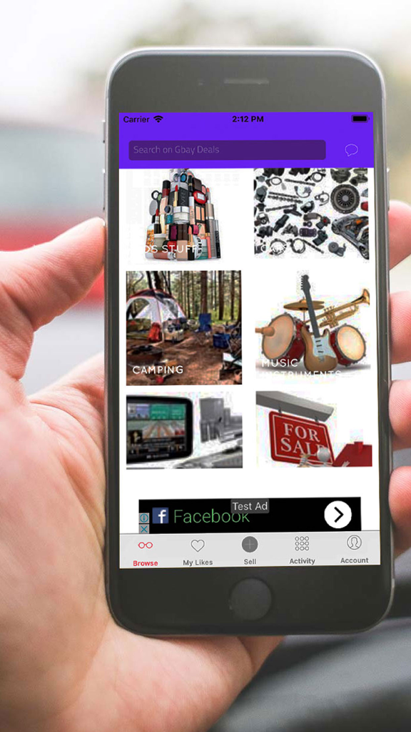 Gbay Deals - A person holding a smartphone displaying the Gbay Deals app marketplace categories including camping and music instruments