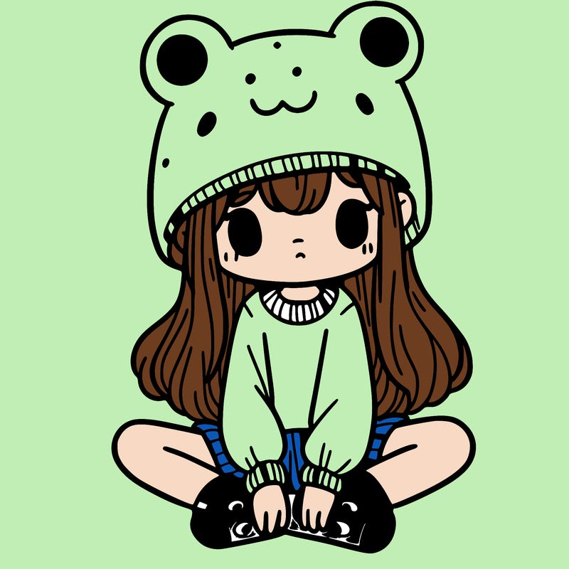 a girl wearing a frog hat and some frog socks