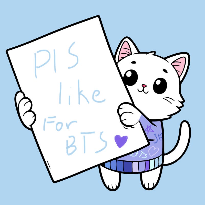 blank piece of paper held by a kitten