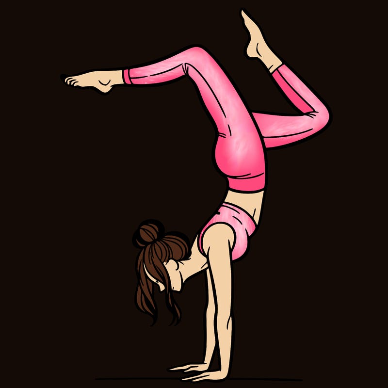 a woman doing a handstand