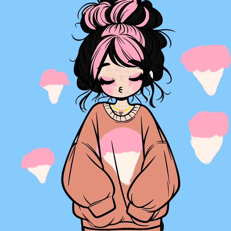 girl with baggy sweatshirt and messy bun