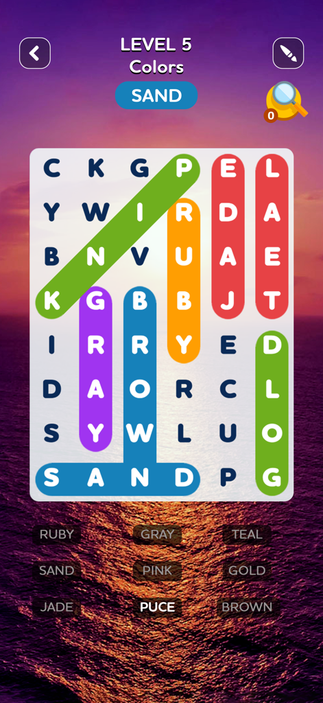 Word Search Quest Puzzles - A word search puzzle gameplay screen featuring color-themed words and a scenic sunset background