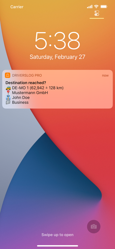 iPhone lock screen showing a Driverslog Pro 2 notification for automatic business trip recording and mileage tracking.