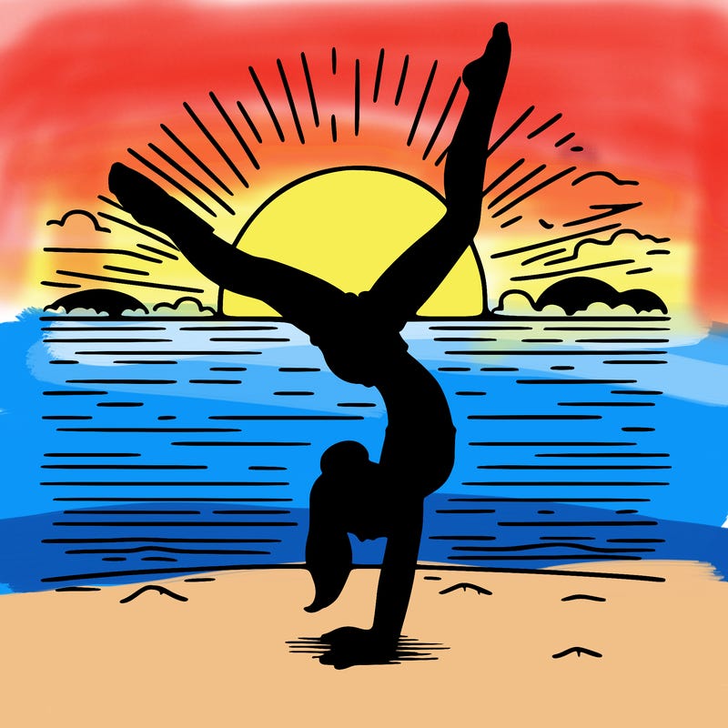 girl doing handstand infront of a sunset