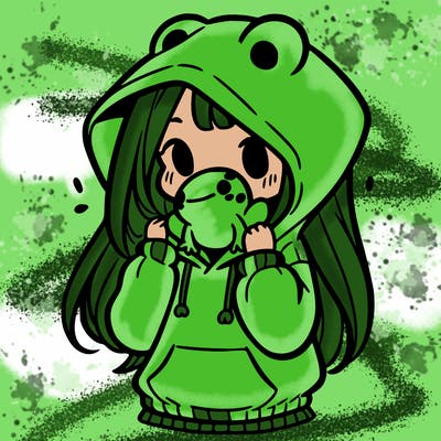 a girl holding a froggy hoodie