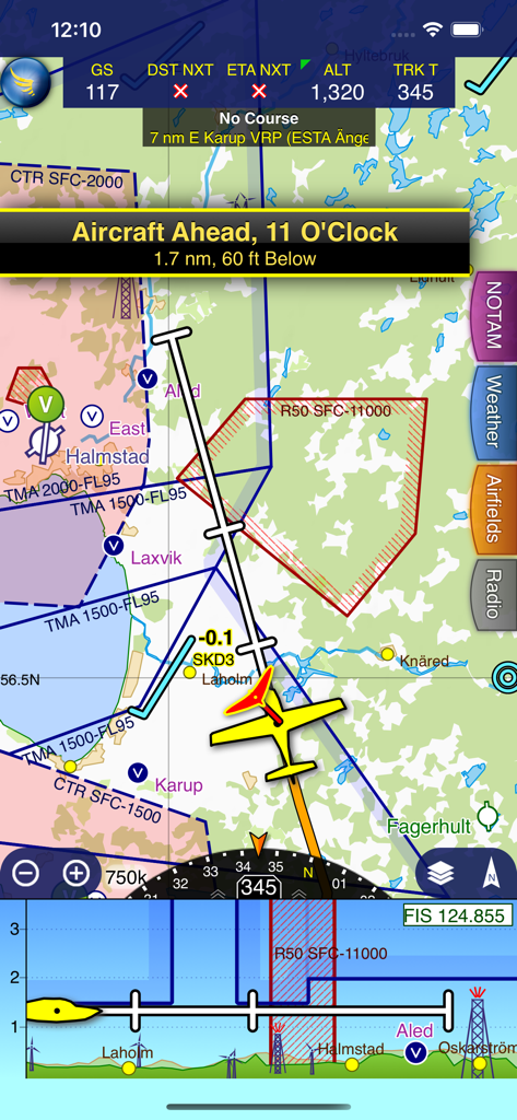 SkyDemon - SkyDemon app screen showing in-flight navigation with a vector map, aircraft traffic alert, and virtual radar.