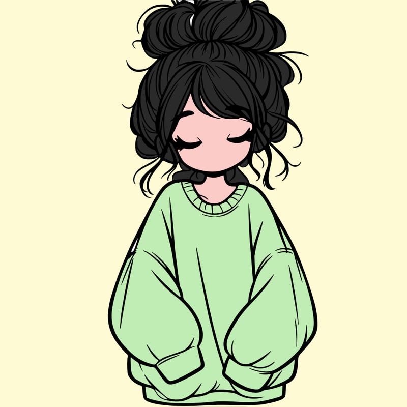 girl with baggy sweatshirt and messy bun
