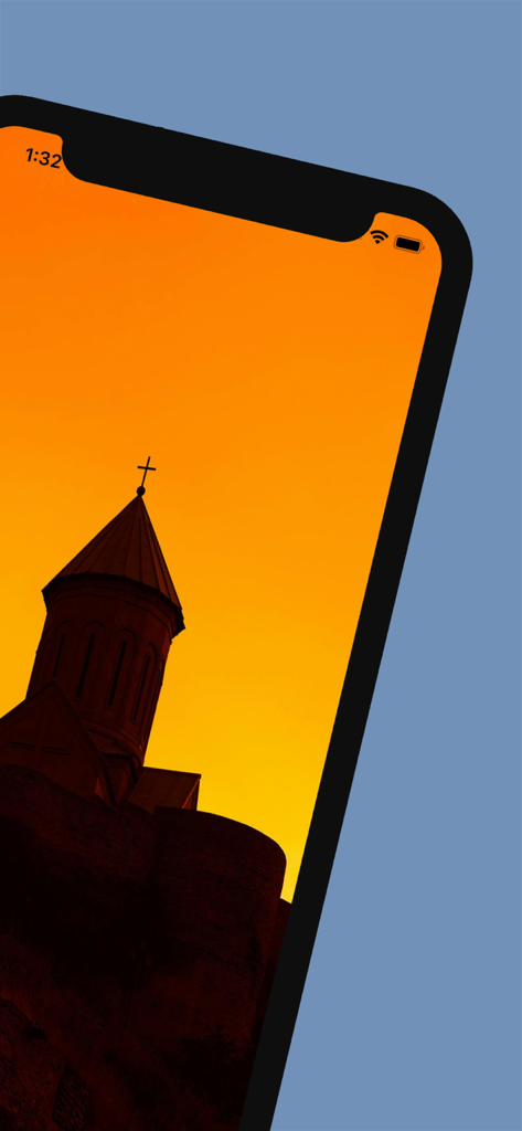 Smartphone-Bildschirm zeigt eine historische georgische Kirche bei Sonnenuntergang in Tiflis