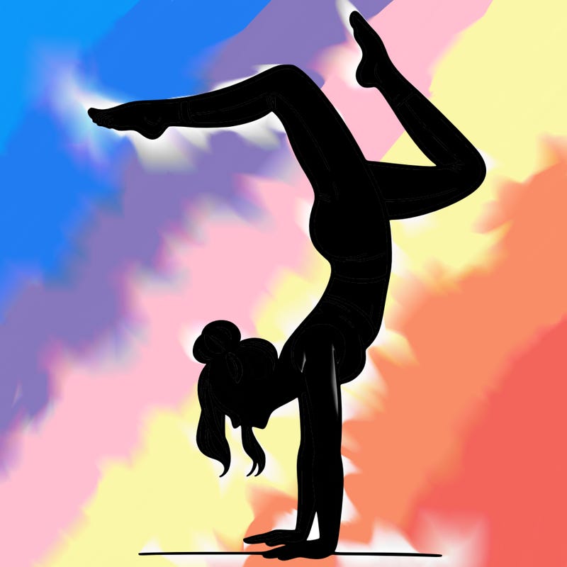 a woman doing a handstand