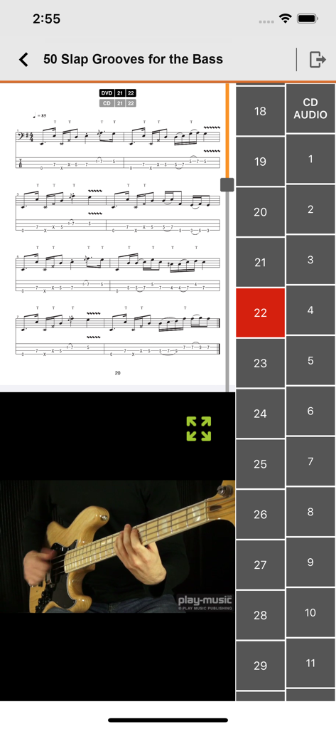 Capture d'écran de l'application Play Musique affichant un tutoriel de guitare basse avec partition et vidéo explicative.