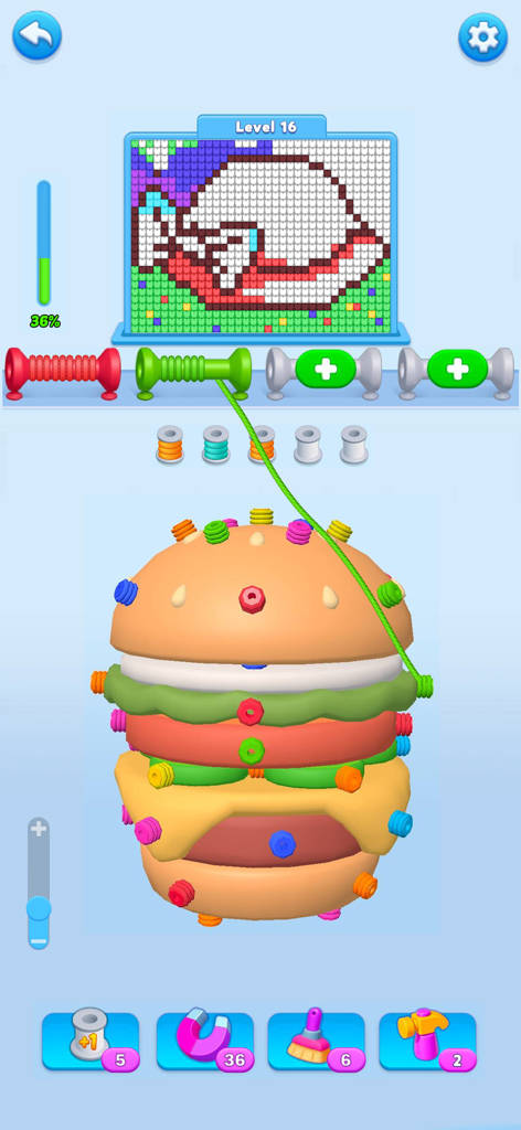 Gameplay di Wool Escape 3D che mostra un puzzle 3D a forma di hamburger e un gatto in pixel art che viene riempito con filato.