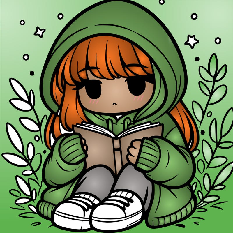 girl in oversized hoodie reading a book