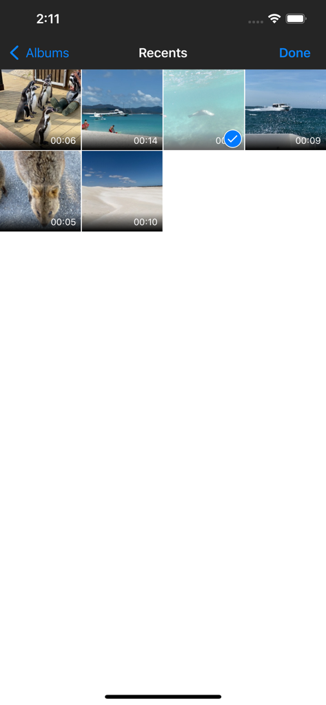 A screen showing a video gallery with a selected video ready for compression.