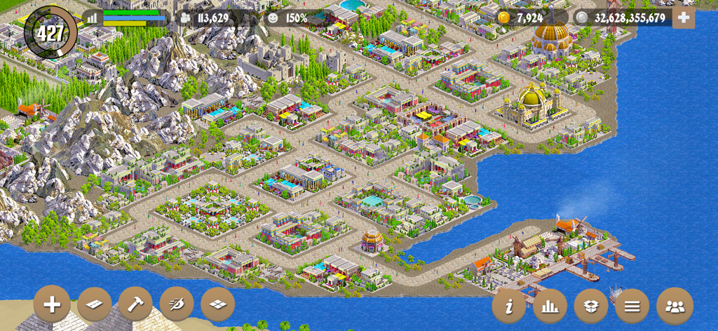 Designer City: Empire Edition - A bird eye view of a large historical coastal city with classical architecture and a port in a city building simulation game.