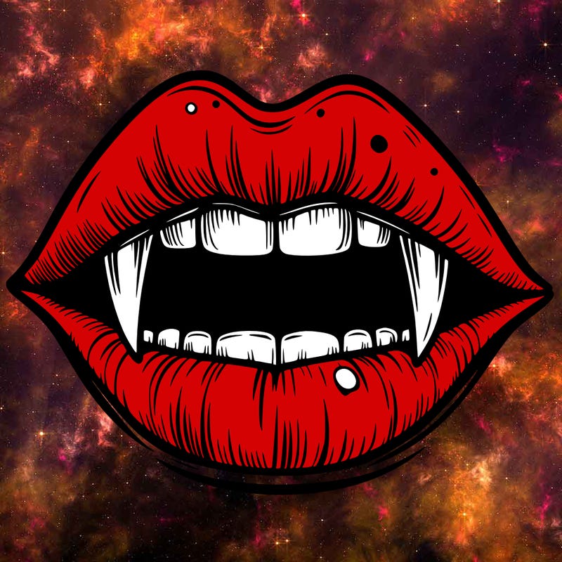 lips with vampire teeth