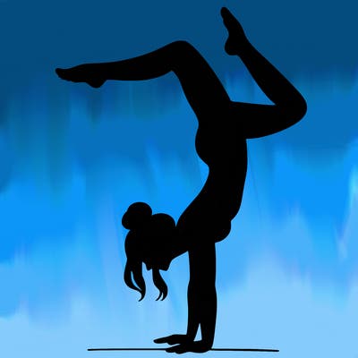 a woman doing a handstand