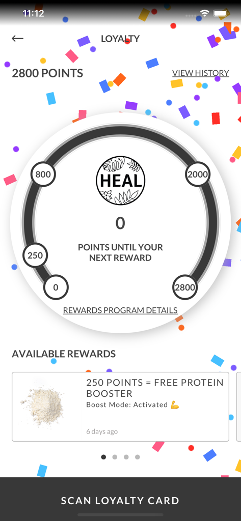 Heal Wellness loyalty rewards screen showing 2800 points earned and a free protein booster reward option.