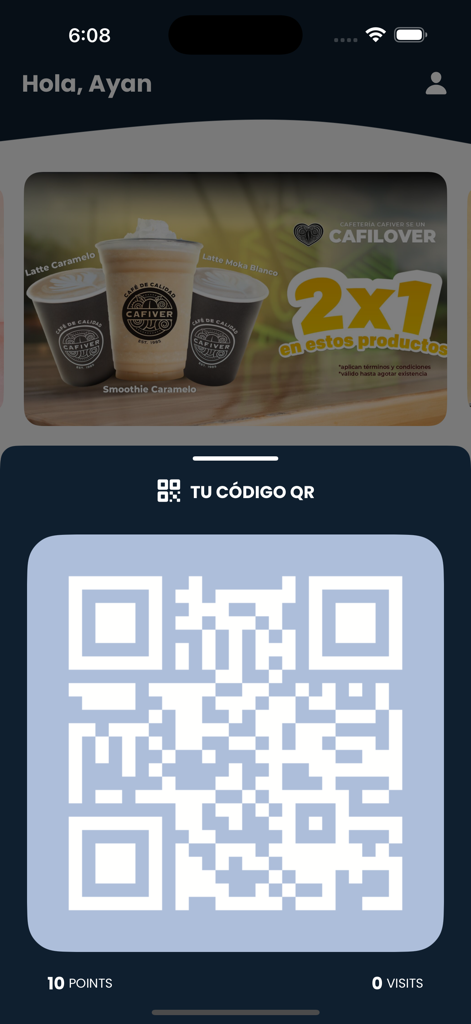Cafilovers - Panel de la aplicación Cafilovers que presenta un código QR de usuario para recompensas y un banner promocional para bebidas de café.