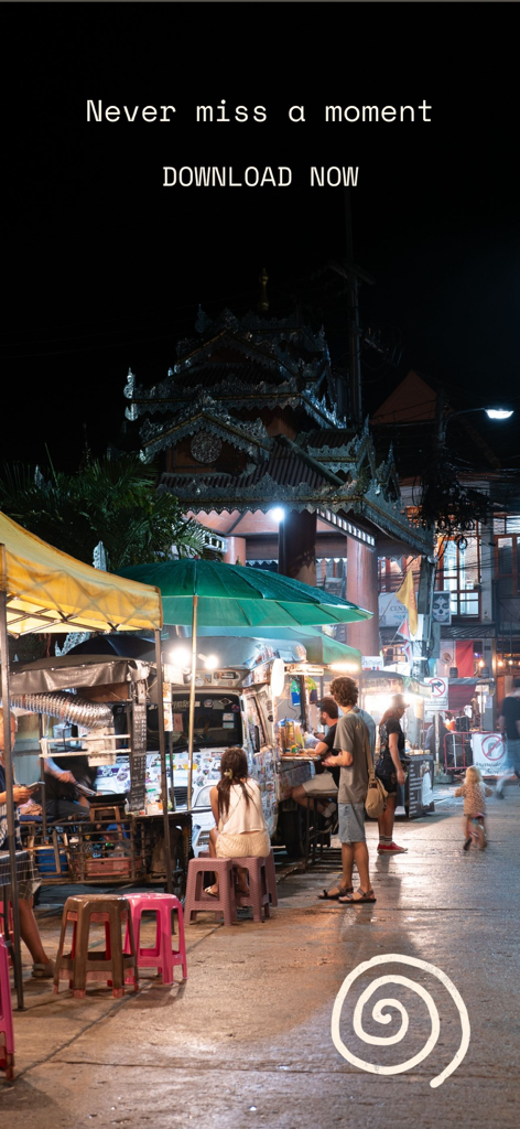Experience Pai - A vibrant night street food market in Pai Thailand with traditional architecture and travelers dining outdoors