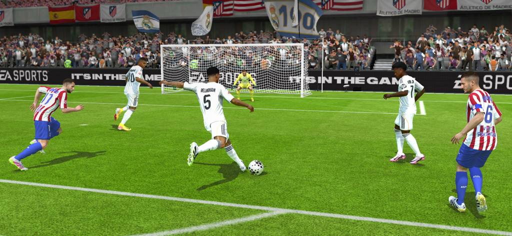 Jude Bellingham from Real Madrid controls the ball during a match in EA SPORTS FC Mobile