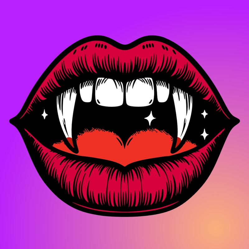 lips with vampire teeth