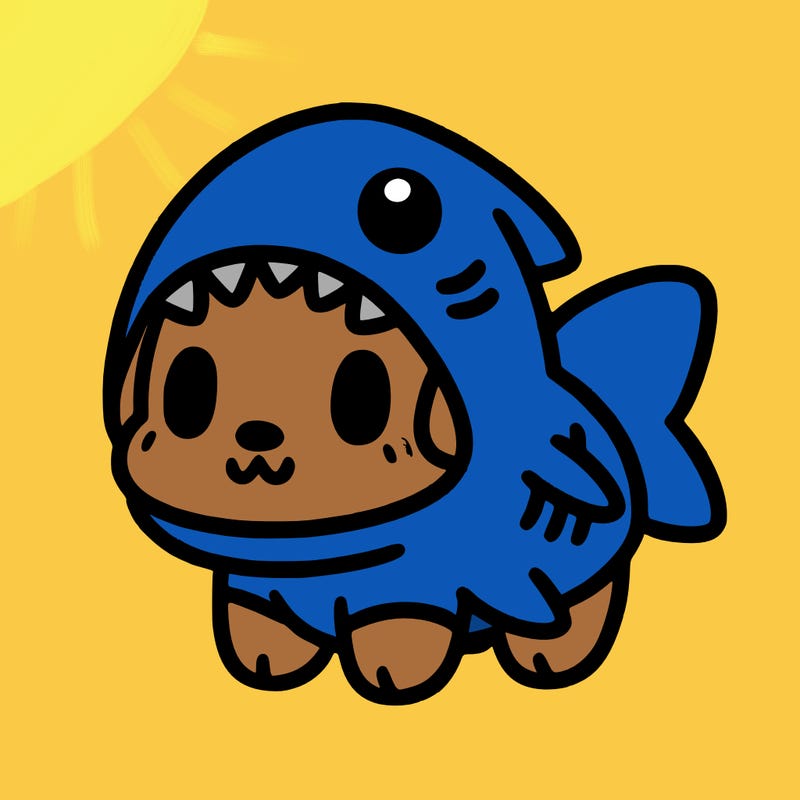 cute dog wearing a shark costume