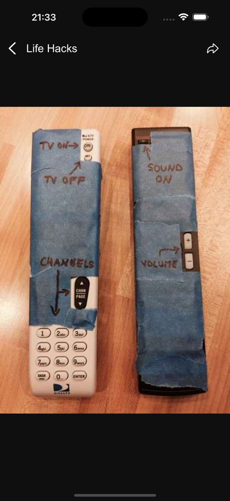 Best Life Hacks 2026 - Two TV remotes with blue tape and handwritten labels to simplify button identification