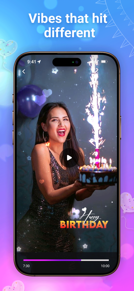 Birthday Video - Smartphone screen displaying a birthday video of a smiling woman holding a cake with a lit sparkler and a Happy Birthday text overlay