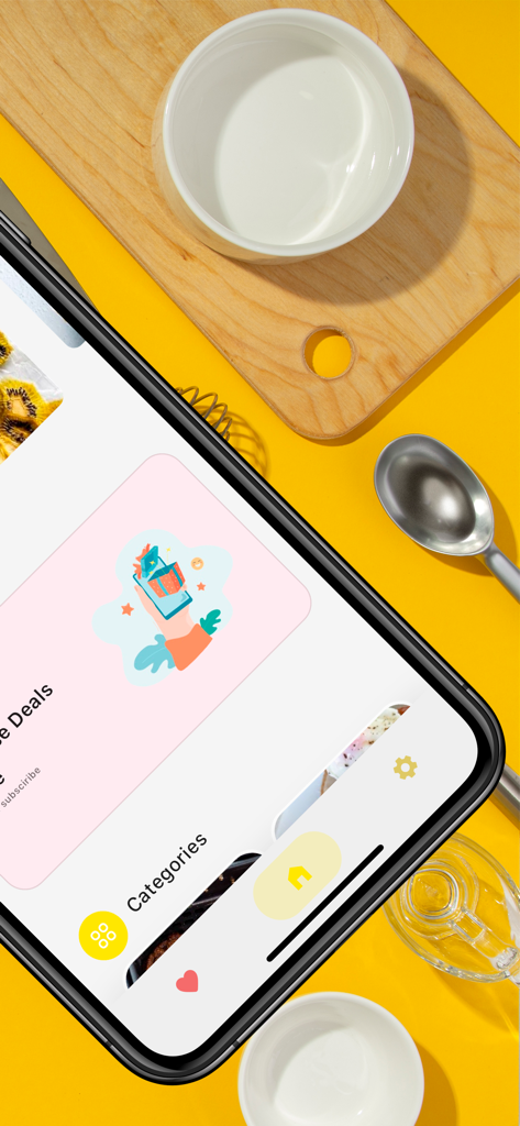 Airfryer Chef: Airfryer Recipe - A smartphone showing the Airfryer Chef recipe app interface on a yellow kitchen surface with cooking utensils