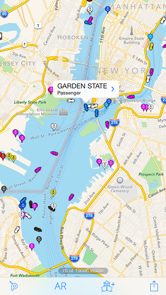 Ship Finder Lite map view tracking live vessels in New York harbor with a passenger ship selected
