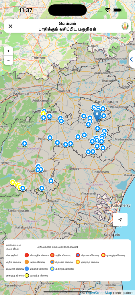 TN-Alert app interface showing a map of Tamil Nadu with markers indicating potential flood impact areas and a risk assessment legend.