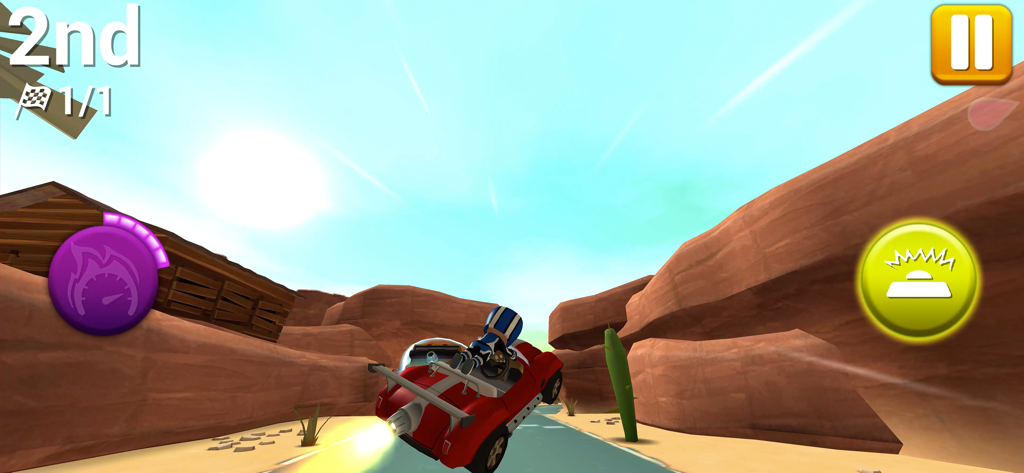 Rev Heads Rallyで、赤い車が砂漠の峡谷トラックをジャンプしている。