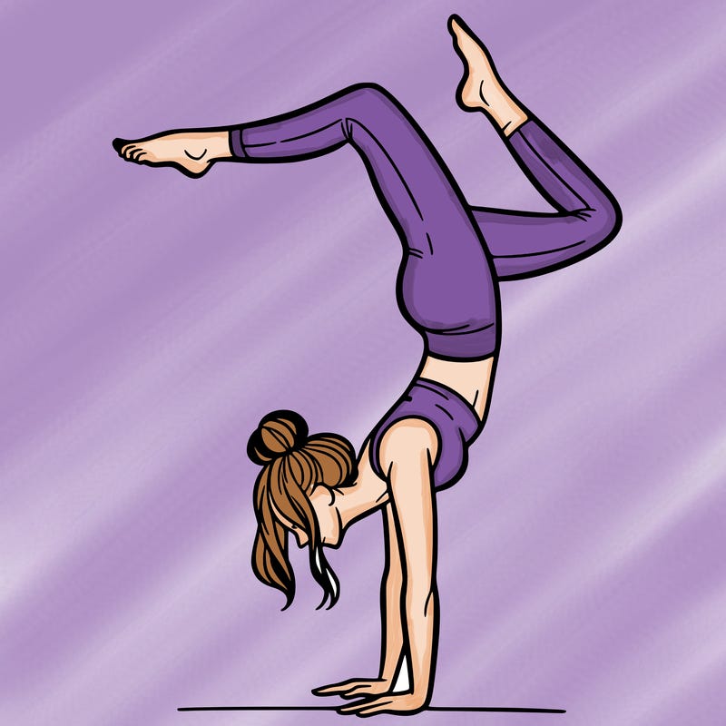 a woman doing a handstand