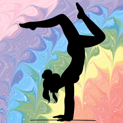 a woman doing a handstand