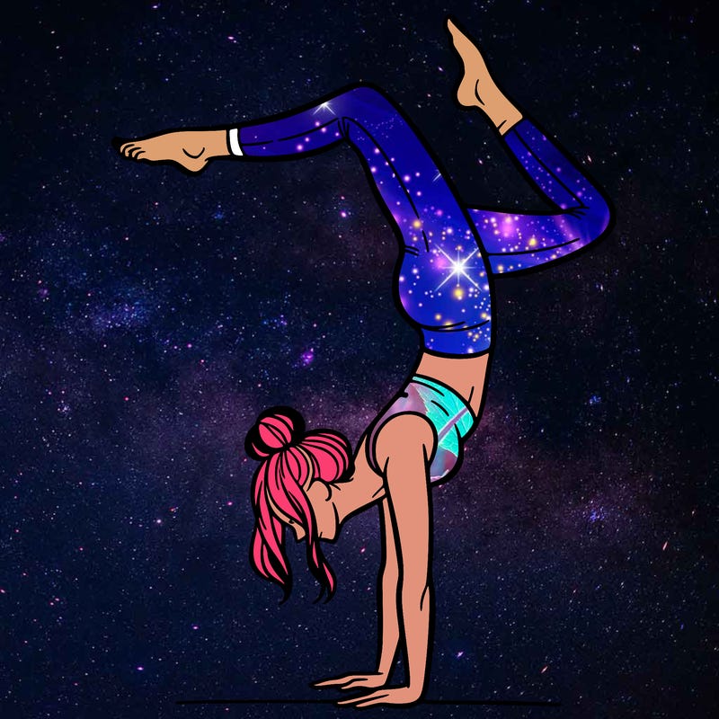 a woman doing a handstand