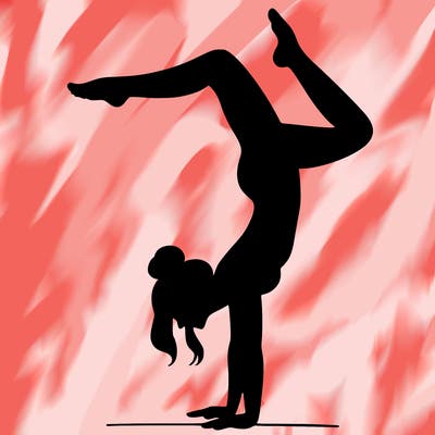 a woman doing a handstand