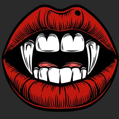lips with vampire teeth