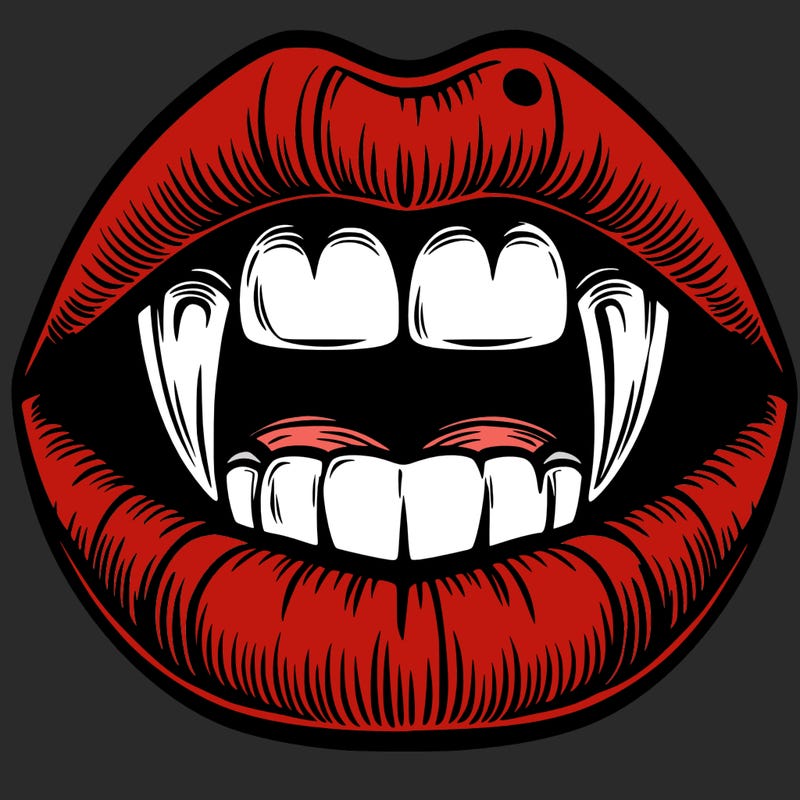 lips with vampire teeth