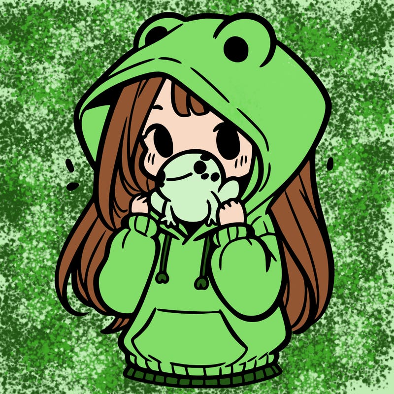 a girl holding a froggy hoodie
