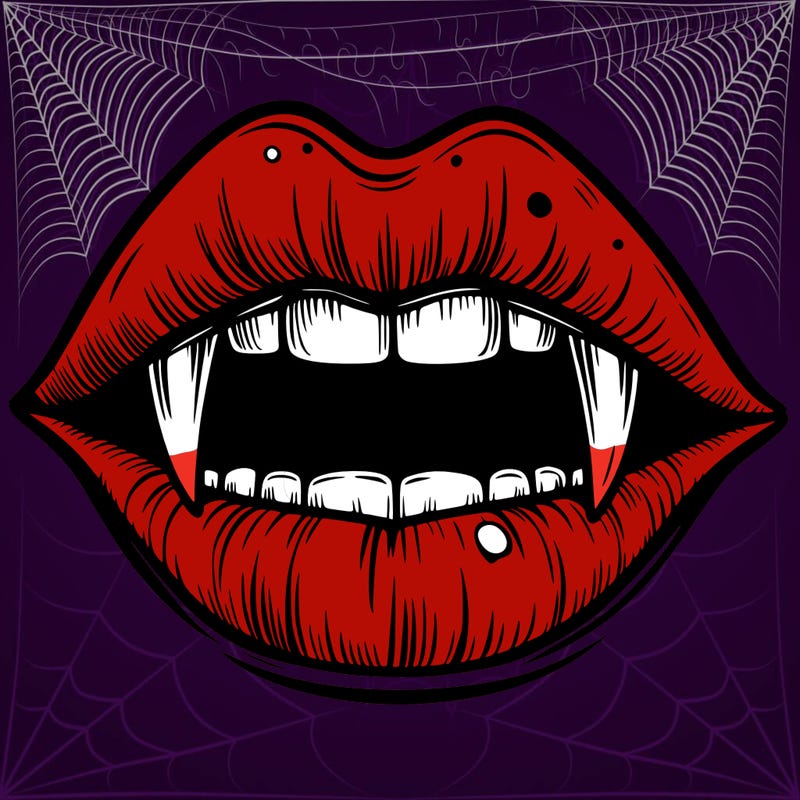 lips with vampire teeth