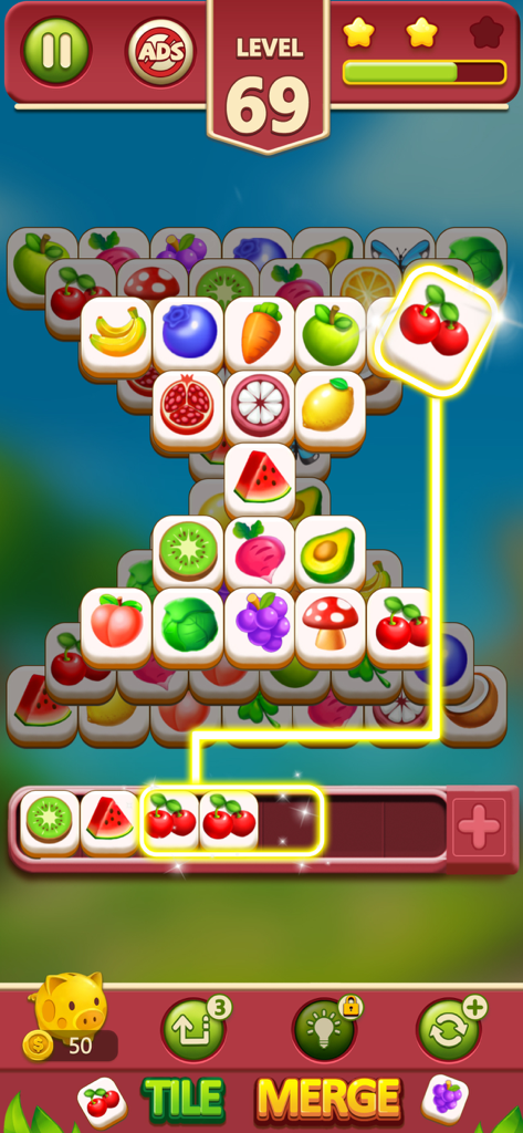 Tile Merge ：Match Puzzle - A screenshot of the Tile Merge Match Puzzle game showing fruit tiles being matched in an hourglass layout