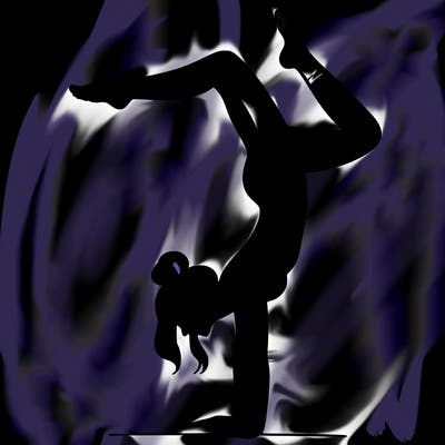 a woman doing a handstand