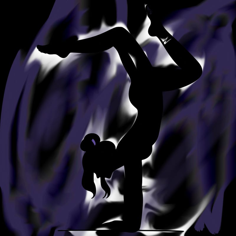 a woman doing a handstand