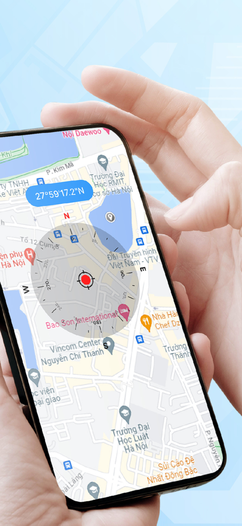A person holding a smartphone showing a map with a compass overlay and GPS coordinates