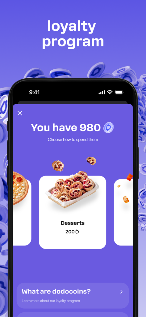 Écran du programme de fidélité de l'application Dodo Pizza affichant le solde de dodocoins et les récompenses de desserts
