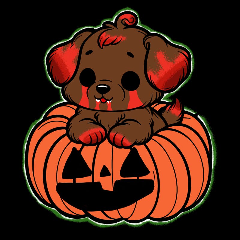 cute little puppy in a pumpkin